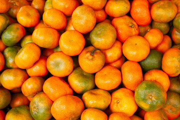 Fresh tangerines in close-up detail