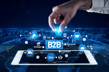 A hand selects a B2B icon from a digital interface on a tablet, representing sales, agreements, and strategies in the vibrant world of e-commerce and global business. Tessel