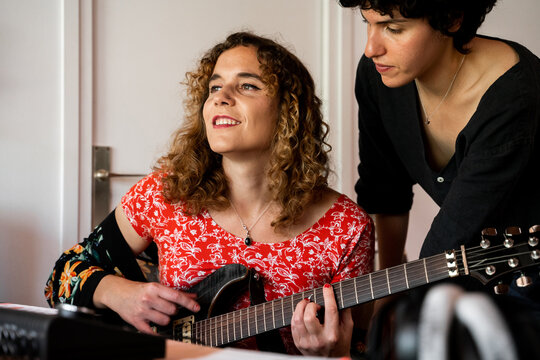 Musician Friends recording music at home studio