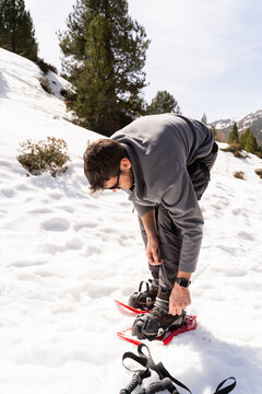 Man wearing snowshoes