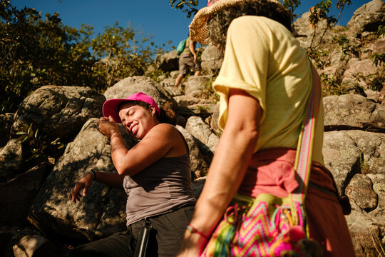 Friends enjoying a sunny outdoor hiking adventure