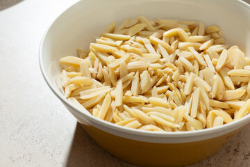 A view of a bowl of slivered almonds.