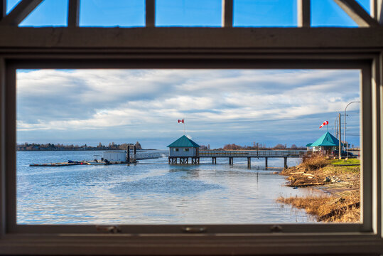 Scenic View of Waterfront Structures Under a Cloudy Sky