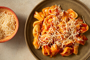 A top down view of a gluten-free, dairy-free tortelloni entree.
