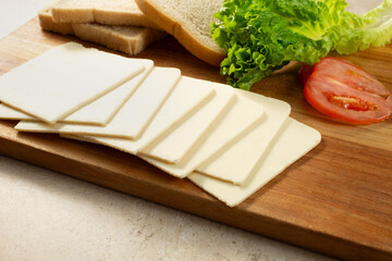 A view of slices of dairy-free Swiss cheese.