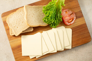 A top down view of slices of dairy-free Swiss cheese.
