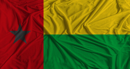 Guinea Bissau flag with fabric texture background. National flag of Guinea Bissau with cloth texture