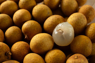 A closeup view of a pile of longan.