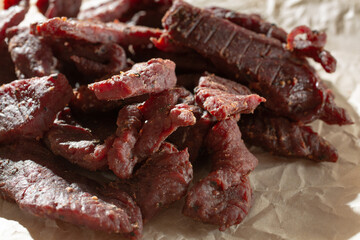 A closeup view of a pile of steak strips.