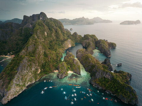 Rocky islands and fishing boats in the ocean