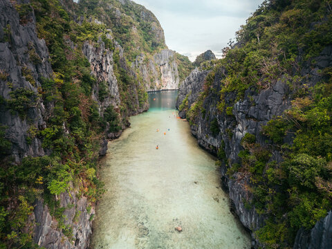 Tropical lagoon with turquoise waters and limestone cliffs