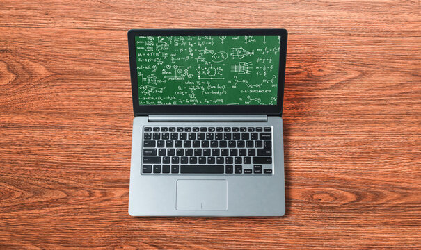 Mathematic equations and modish formula on computer screen showing concept of science and education