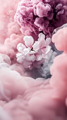 A close-up of a flower surrounded by pink and purple smoke. The image has a dreamy and abstract feel.