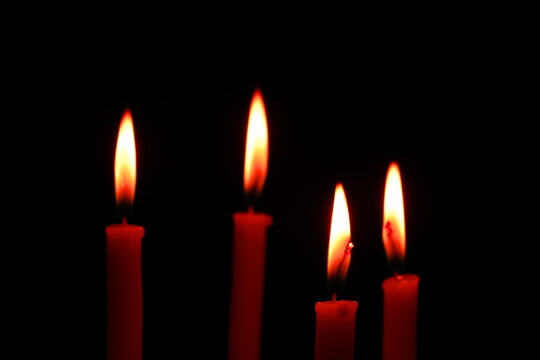 The four candles of advent in the dark
 - Powered by Adobe