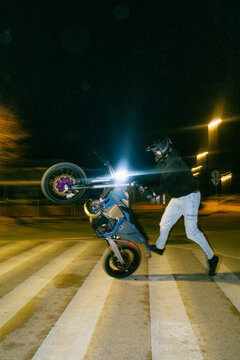 Motorcycle Stunt on Pedestrian Crossing
