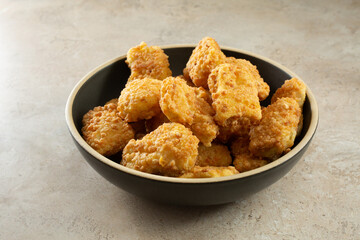 A view of a bowl of gluten-free chicken nuggets.