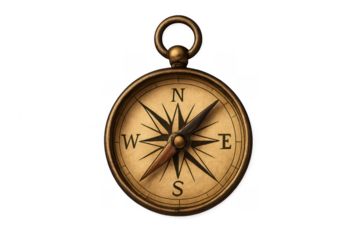 Vintage brass compass navigating direction and discovery