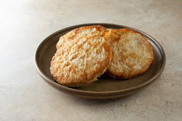 A view of a plate of turkey patties.