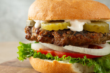 A closeup view of a gluten-free hamburger.