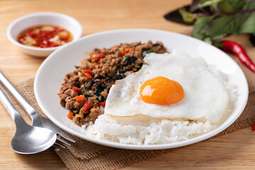 Thai food, Stir fried holy basil with minced pork with cooked rice and fried egg on top