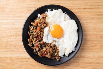Thai food, Stir fried holy basil with minced pork with cooked rice and fried egg on top