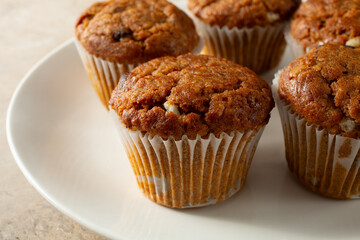 A closeup view of some dairy-free, gluten-free baked berry vanilla oat cups.