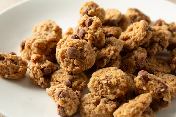A view of a pile of gluten-free, dairy-free soft baked mini chocolate chip cookies.