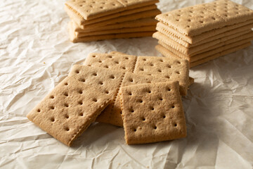 A view of a pile of gluten-free, dairy-free graham crackers.