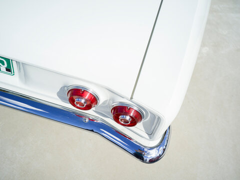 White Vintage Car with Tail Fins