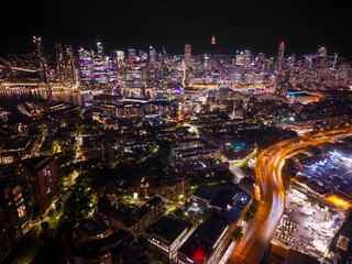 Anzac bridge city traffic and city skyline at night
