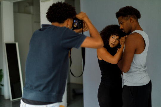 Model Poses for a Photographer 