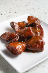 A view of a plate of soy vegan wings.