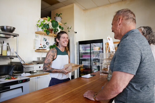 Cashier interacting with a customer