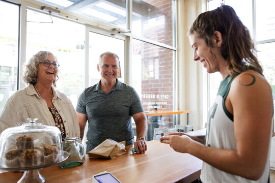 Happy customers at a local cafe