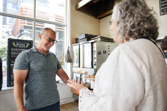 Friendly interaction in a modern cafÃ©