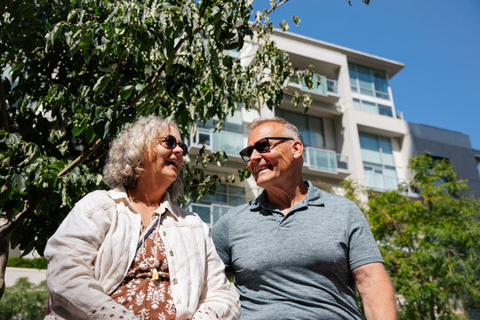 Smiling couple enjoying urban outdoors