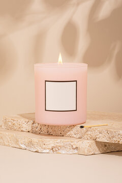 Pink Lit Candle with Shadows