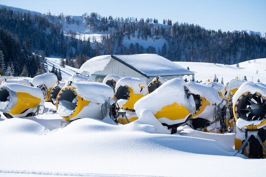 Snow-covered snowmaking machines