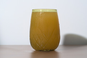 Orange Juice in a Pineapple-Shaped Glass