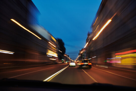 City streets come alive during evening drive