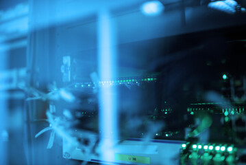 Blue Light Glowing Inside Server Room