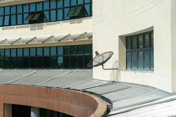 Fototapeta premium Satellite Dish on Modern Building Exterior