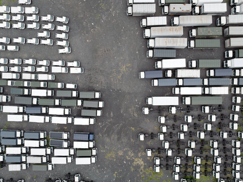 Aerial view of truck parking lot with rows