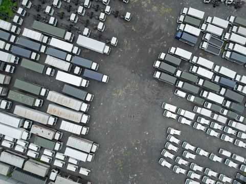 Aerial view of truck parking lot with rows