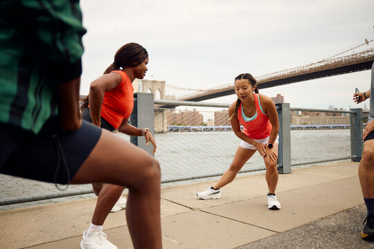 Athletes warm up at the waterfront