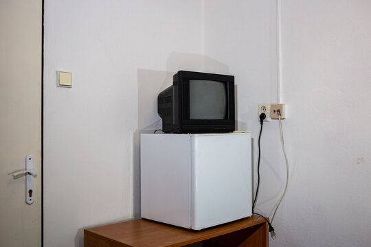 Television and refrigerator in room