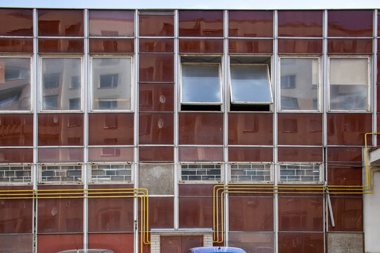 Facade of a house made of brown glass