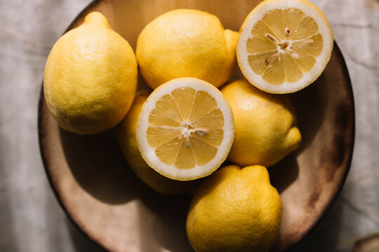 Fresh and Juicy Lemons in a Bowl