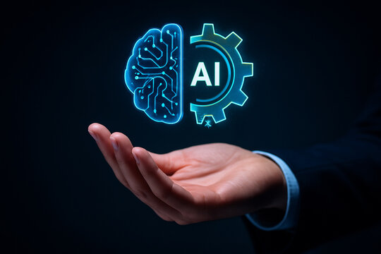 AI generated futuristic image of a human hand supporting a glowing holographic brain and gear symbol representing artificial intelligence collaboration technology innovation advanced digital thinking - Powered by Adobe