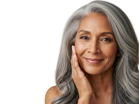 Beautiful mature african american woman with long flowing gray hair touching her cheek smiling against a transparent background isolated on transparent background
